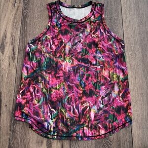 A Lululemon top multi color in small with mesh inside just like new, no flaws.